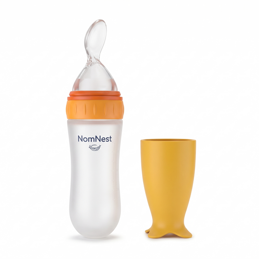 NomNest silicone squeeze baby feeder - orange with yellow cap cup
